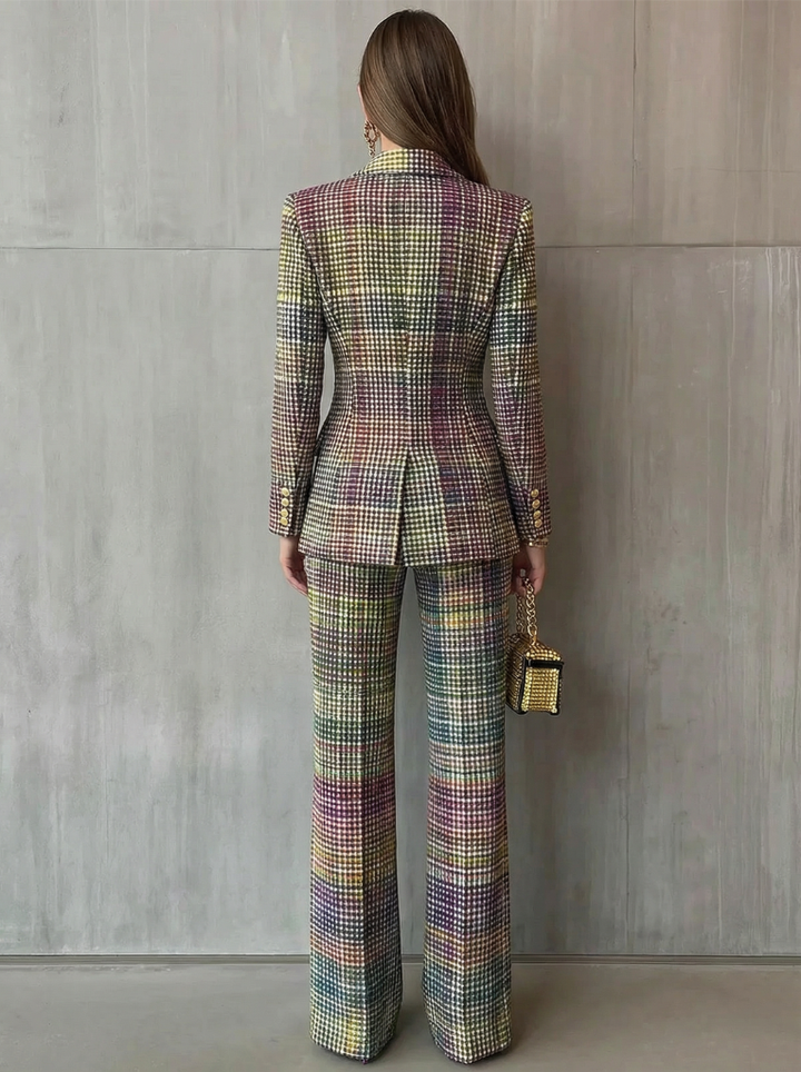 Statement women's multicolour plaid suit set. Trendsetting blazer and wide-leg pants for a modern, chic look.
