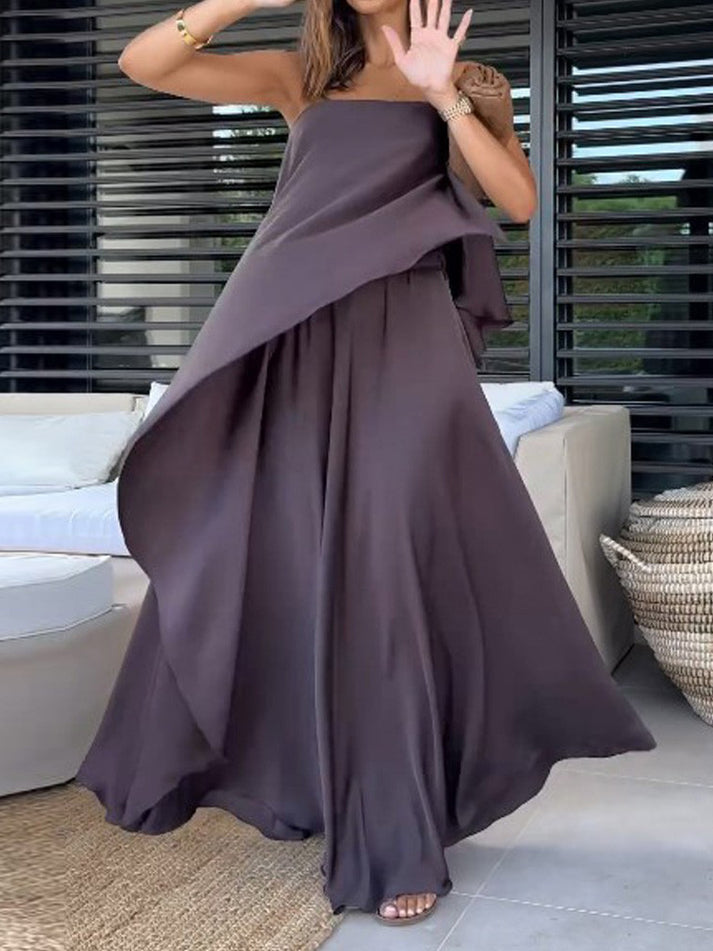 Stylish women's off-shoulder top and flowy maxi skirt two-piece set, perfect for summer chic fashion.