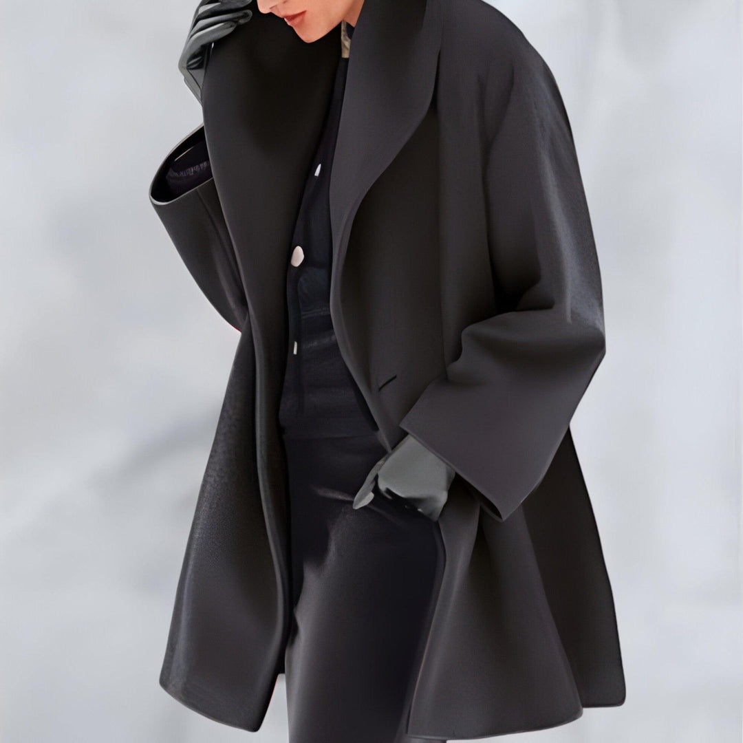 Elegant long oversized coat for women. A chic layering piece suitable for fall, winter, and spring outerwear.