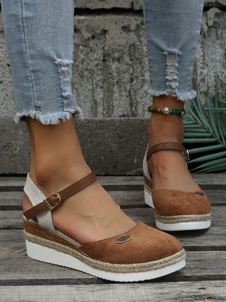 Women's chic platform espadrille sandals for summer. Elevated closed-toe style, comfortable and fashionable.