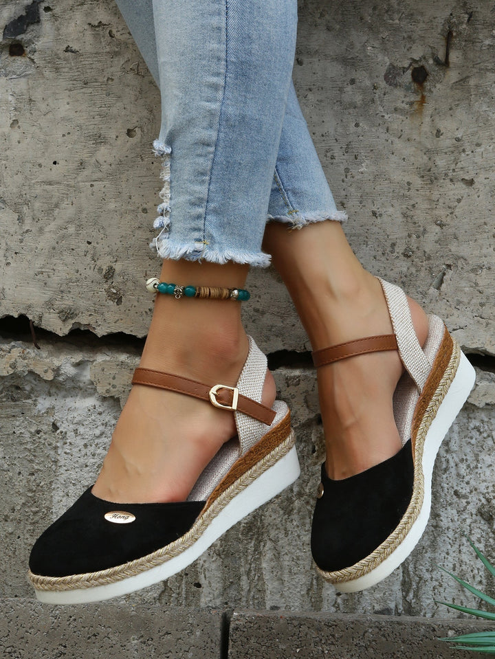 Stylish women's platform espadrille summer sandals. Comfortable, elevated closed-toe design, perfect for chic casual wear.
