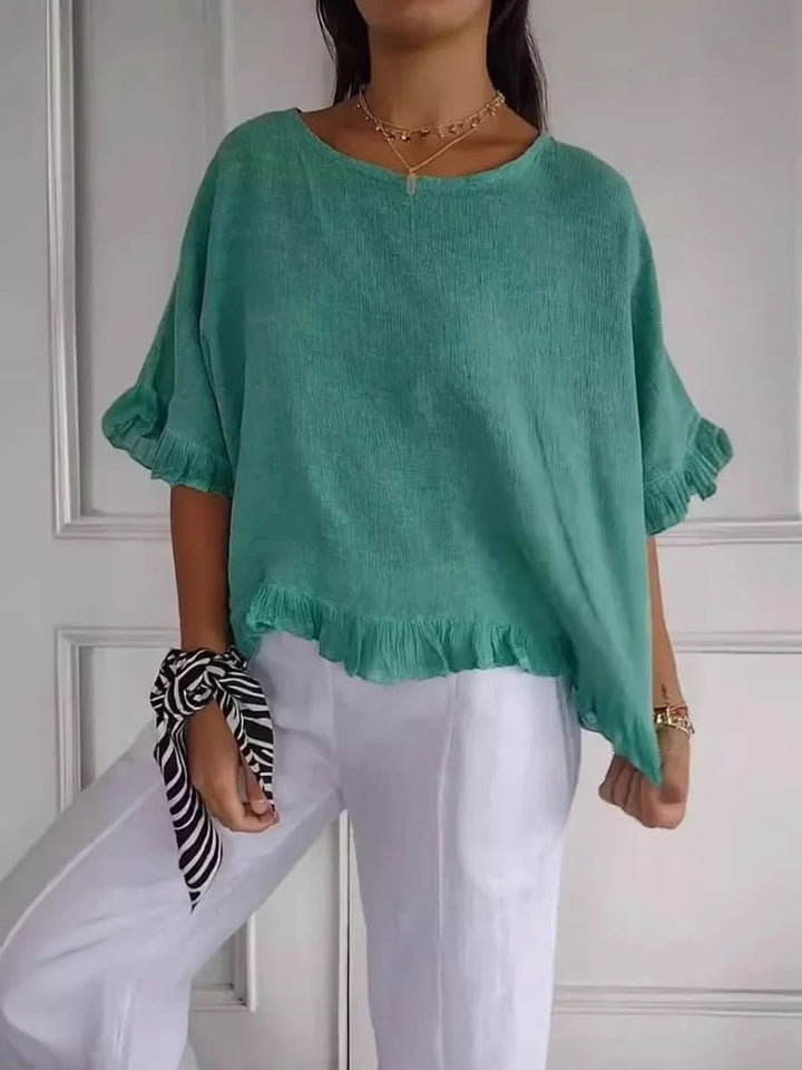 Lightweight women's chic ruffle blouse, an elegant top with a flattering fit for any occasion.