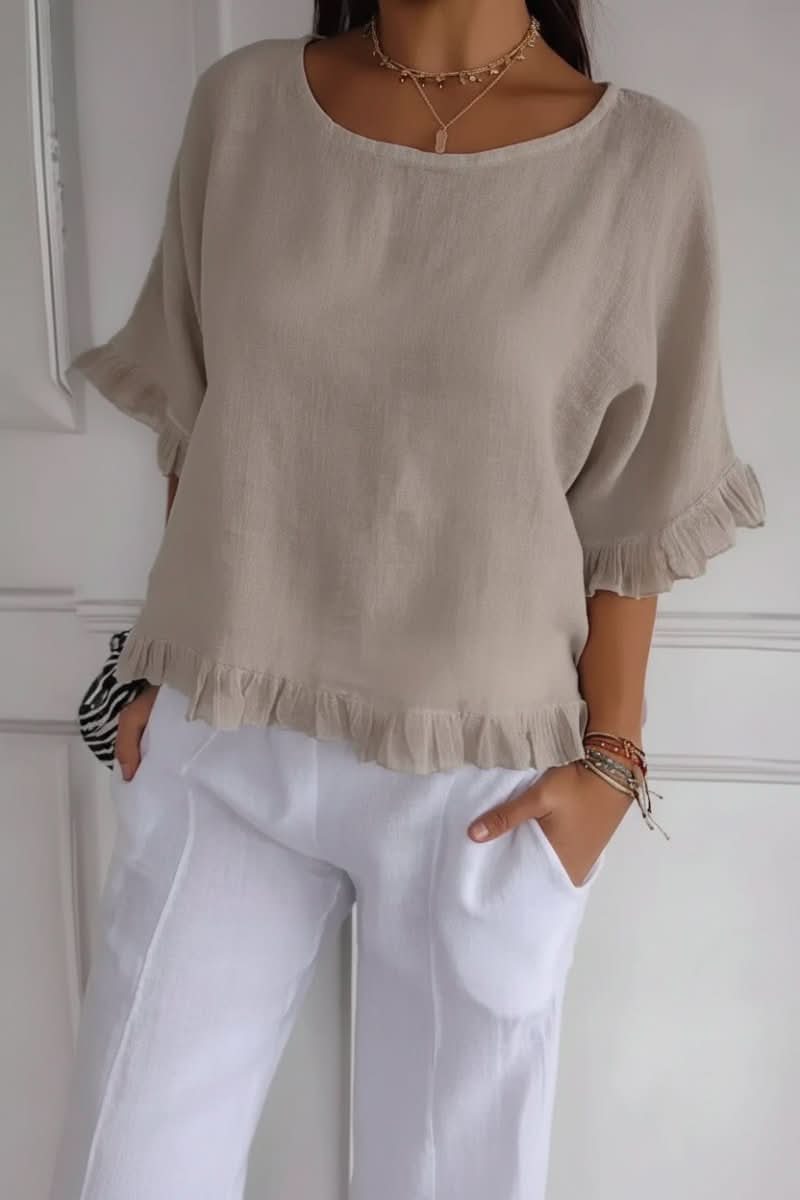 Stylish women's ruffle blouse, a chic and versatile top for summer, office, or casual outings.