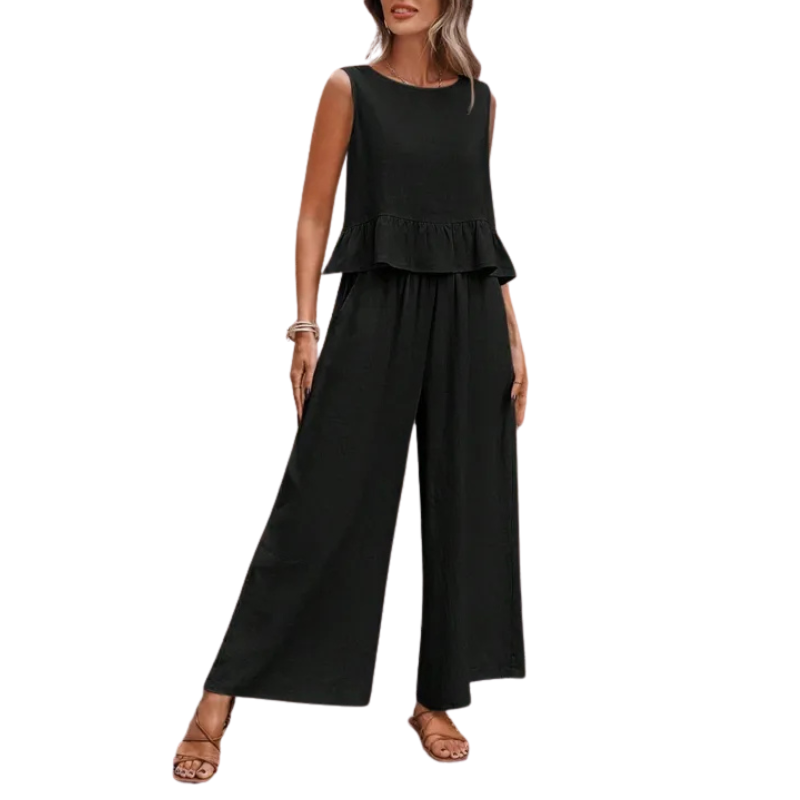 Relaxed fit women's coordinated ruffle tank top and wide leg pants set, ideal for versatile everyday or resort wear.