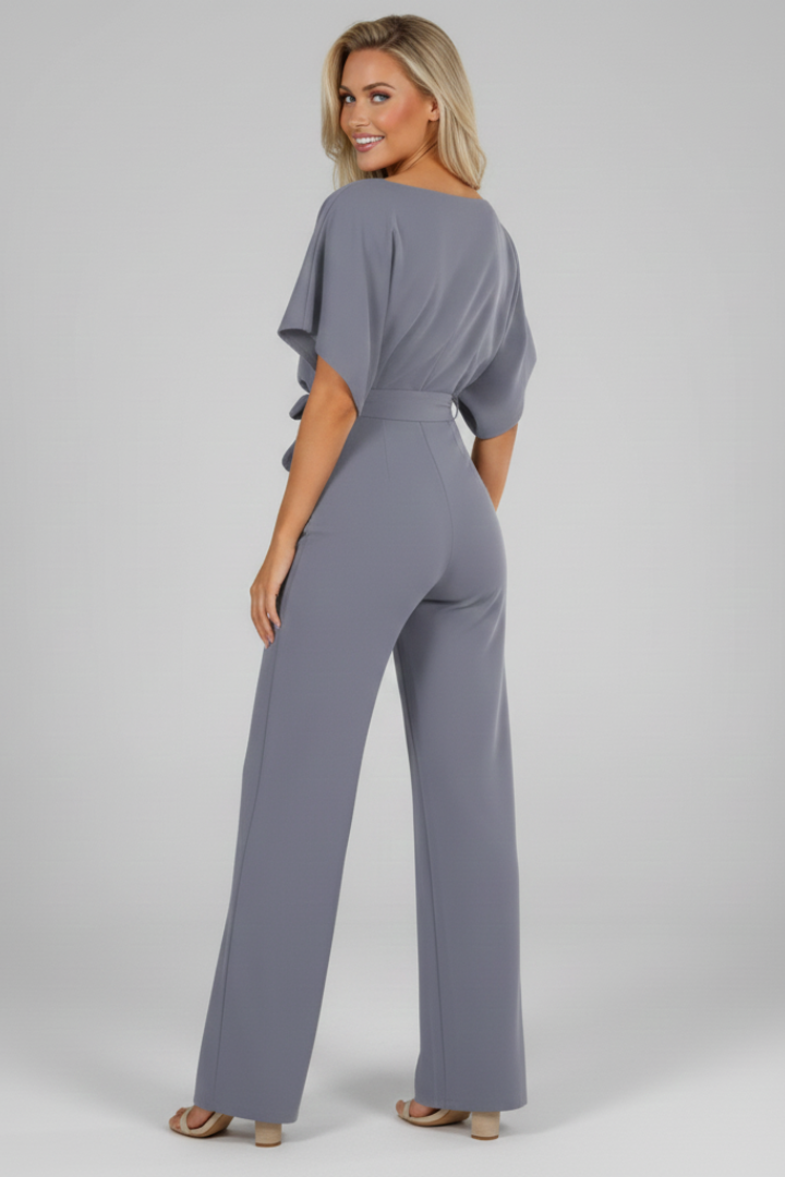 Comfy & versatile short sleeve women's jumpsuit with an elegant waist tie, ideal for casual and chic outfits.