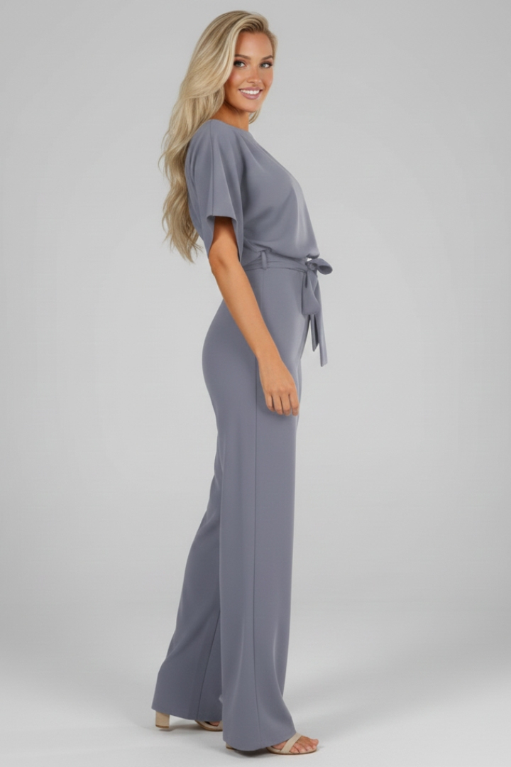 Elegant women's short sleeve jumpsuit with a stylish waist tie, creating a flattering silhouette for fashion.