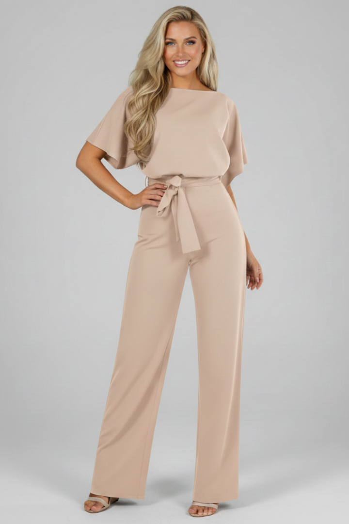 Women's short sleeve jumpsuit featuring a flattering waist tie, a modern and comfy one-piece fashion outfit.