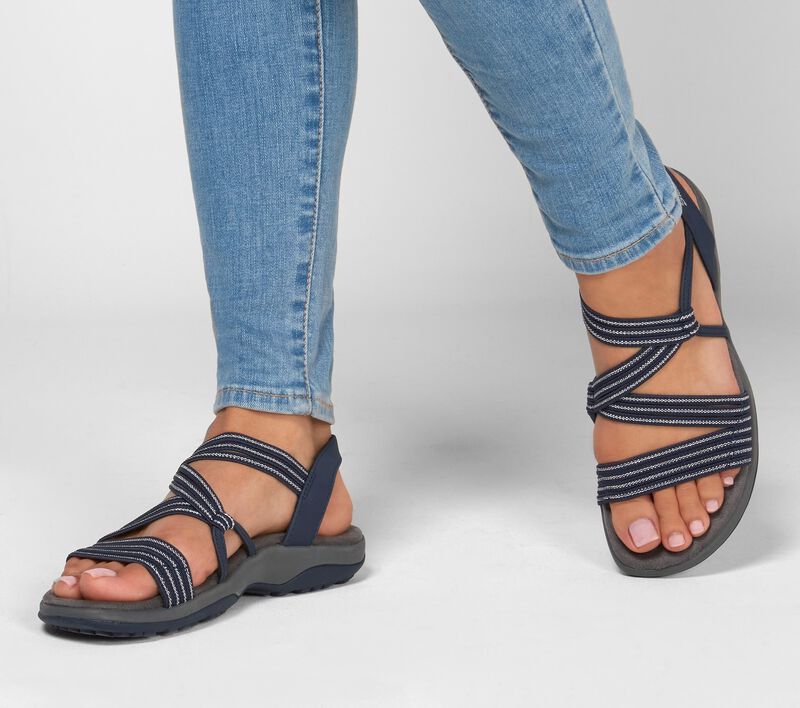Casual women's slip-on sandals with a chic design. Perfect cushioned footwear for everyday summer comfort.