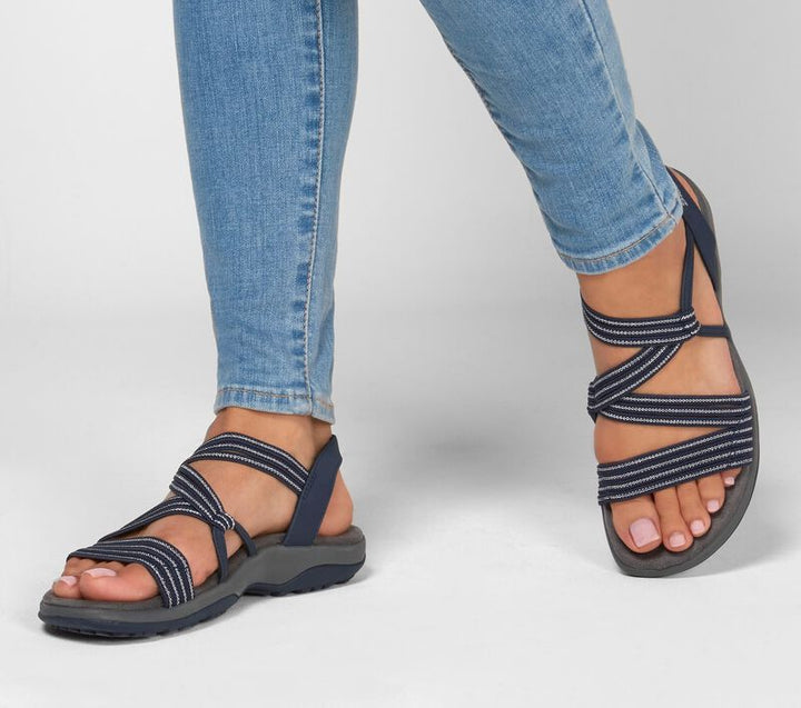 Casual women's slip-on sandals with a chic design. Perfect cushioned footwear for everyday summer comfort.