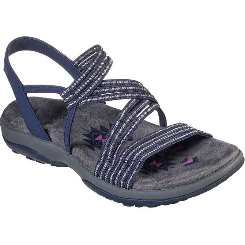 Comfortable women's slip-on sandals with soft, cushioned footbed. Chic and lightweight footwear for everyday summer.
