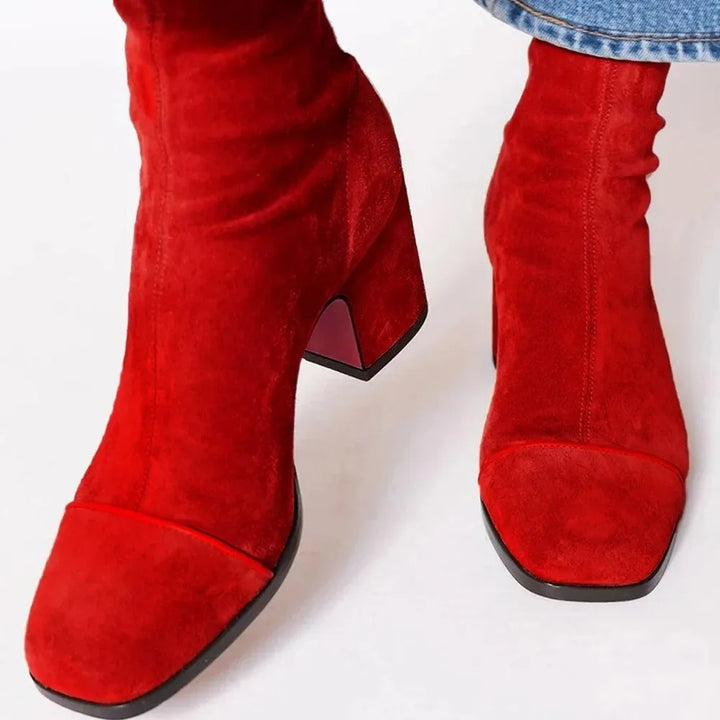 Fashionable women's square toe heeled boots, perfect for a chic and modern look.