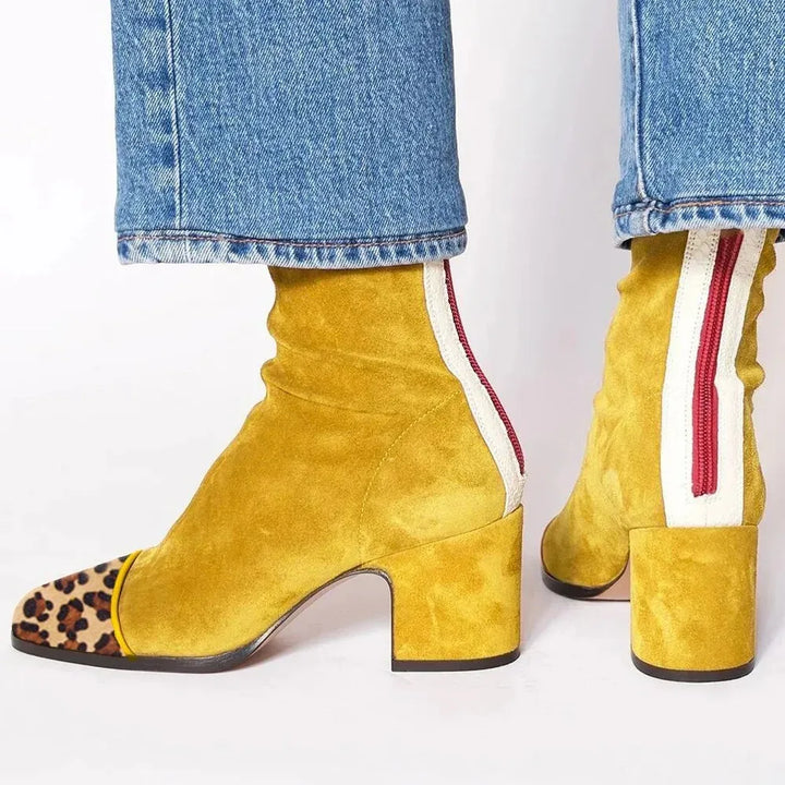 Stylish women's chic square toe heeled boots for a contemporary fashion statement.