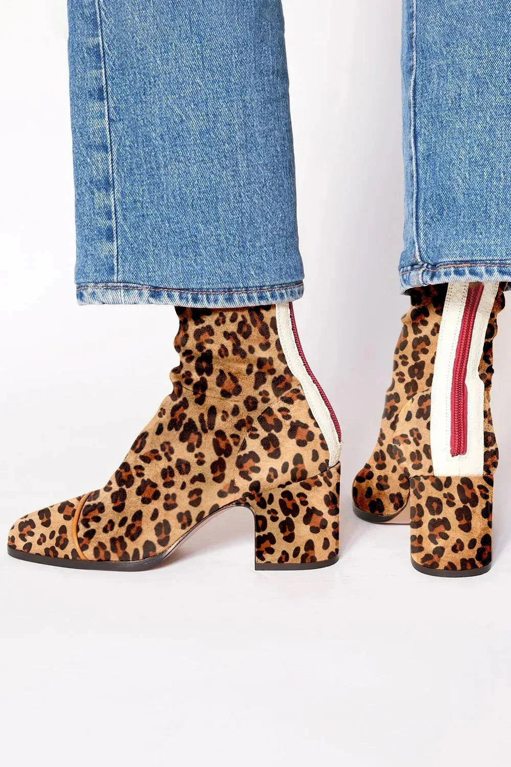 Trendy women's leopard print square toe heeled ankle boots, adding flair to any outfit.