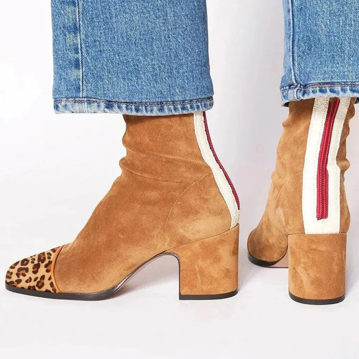Elegant women's square toe heeled ankle boots, designed for fashion and comfort.