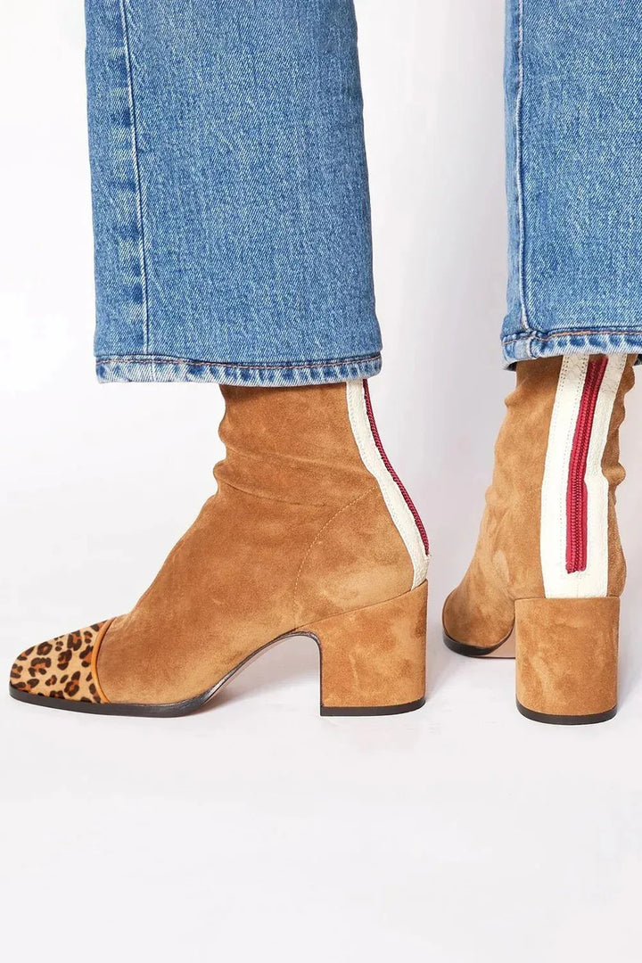 Women's stylish square toe heeled boots, ideal for versatile everyday wear.