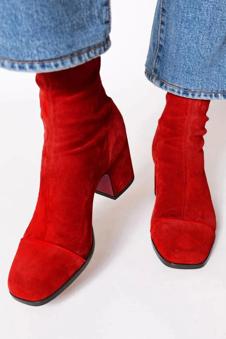 Sleek women's square toe ankle boots with a fashion-forward block heel. Step out in style.