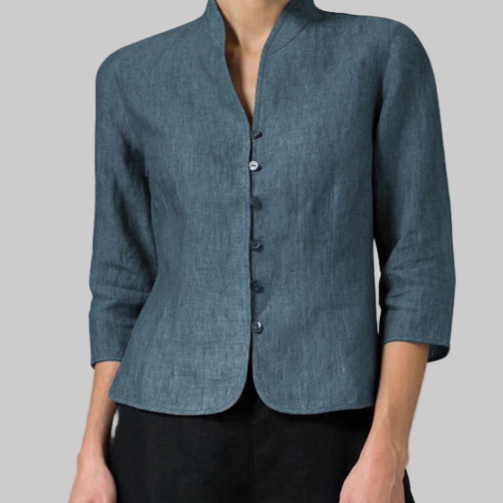 Versatile women's blouse featuring a stand collar & three-quarter sleeves. Stylish button-down, perfect for professional or casual.