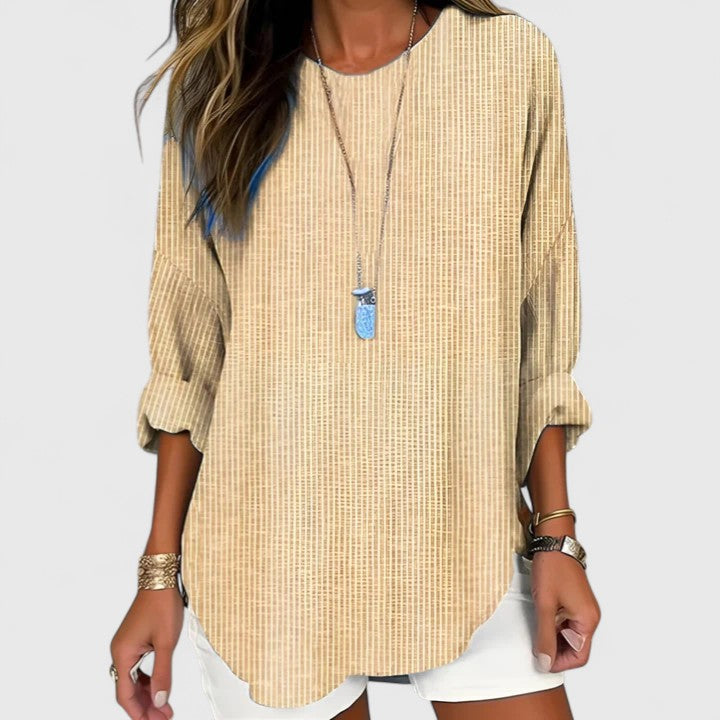 Women's chic striped blouse with crew neck, perfect for casual or work wear. Comfortable & versatile everyday top.