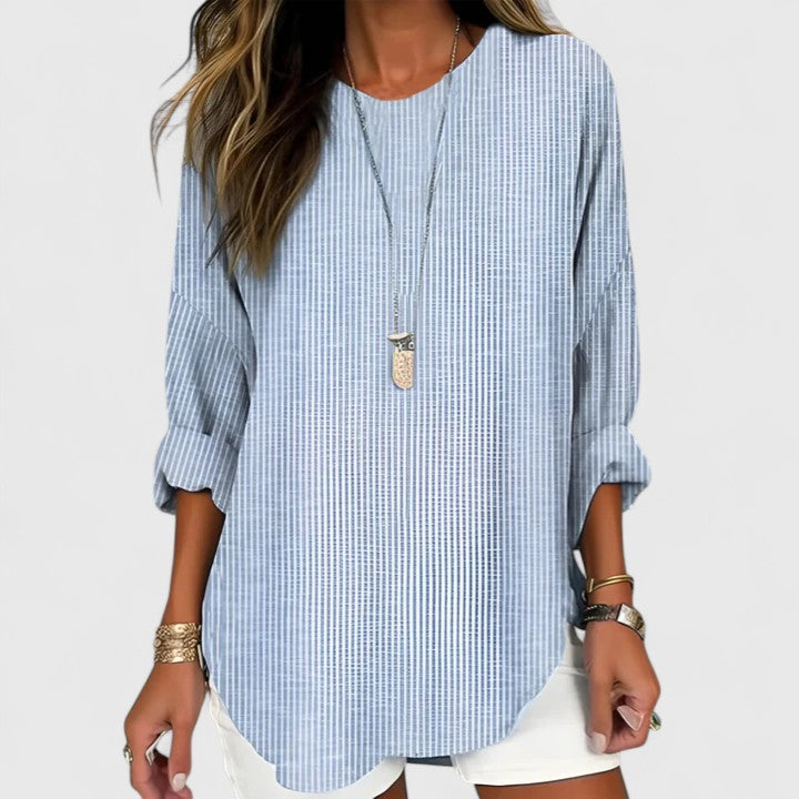 Relaxed fit women's striped casual blouse. Comfortable crew neck top, ideal for chic everyday wear & layering.