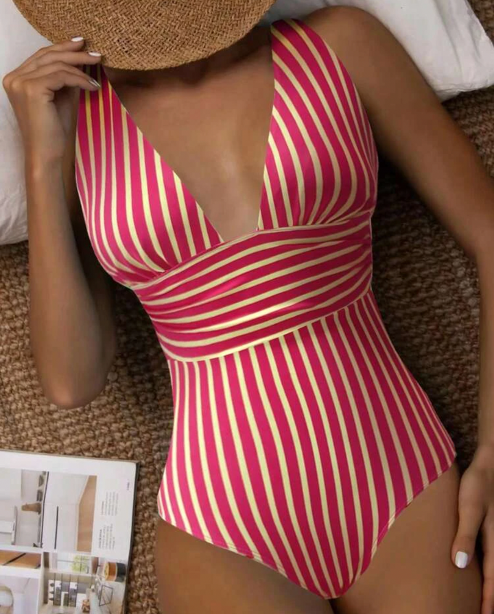 Trendy striped one-piece women's swimwear, a chic summer fashion statement for any beach or poolside event.