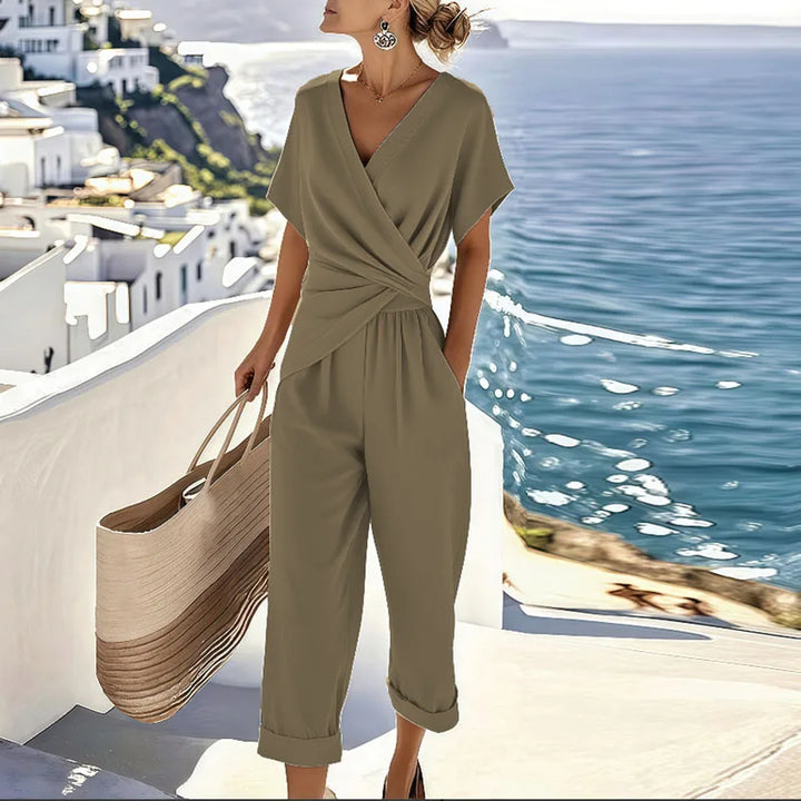 Comfortable women's two-piece pants set with an elegant wrap top and relaxed fit cropped pants for stylish summer casual wear.