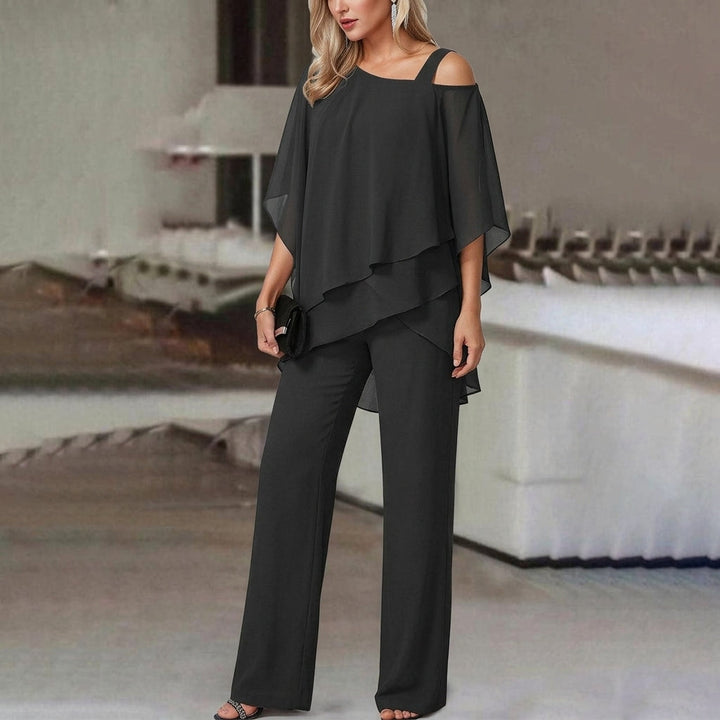 Red, white, or black women's asymmetric top & straight leg pant set. Elegant, versatile, day-to-night modern fashion.