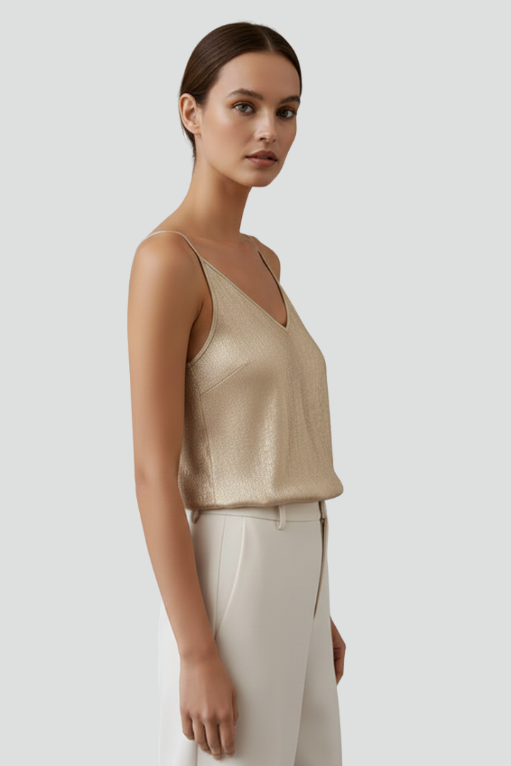 Fashionable women's V-neck blouse with thin adjustable straps, perfect for casual or dressed-up outfits.