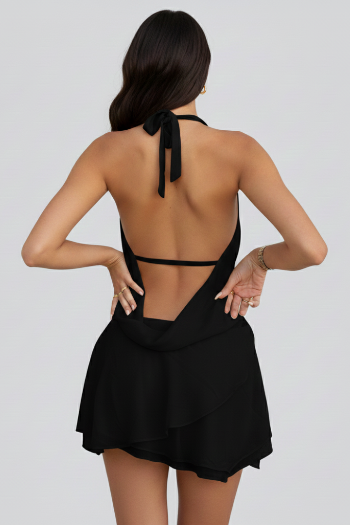 Elegant open back mini dress for women. A chic party & evening wear choice with a flattering V-neck.