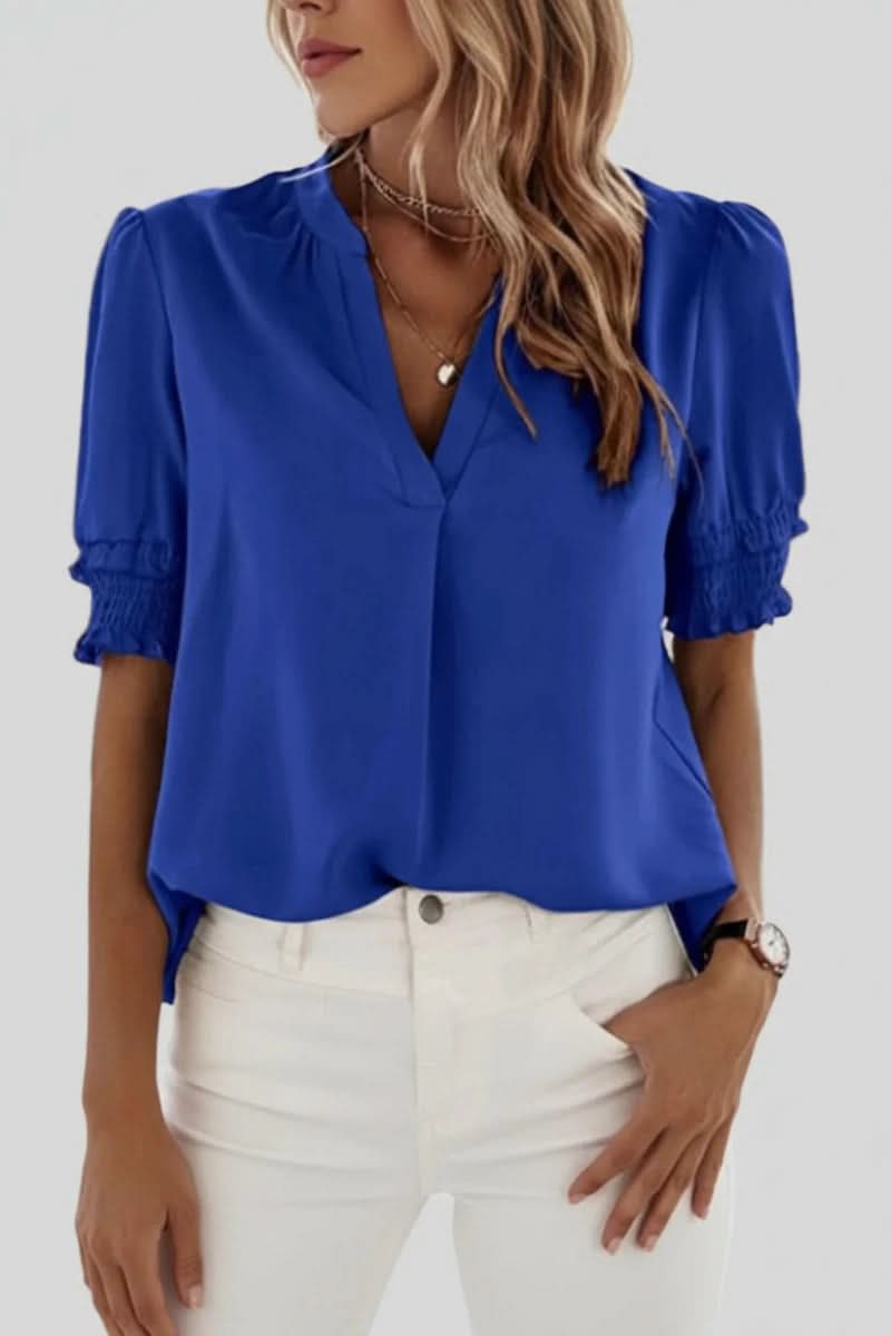 Versatile women's flowy V-neck puff sleeve blouse. Chic short sleeve top for spring, summer, and casual elegance.