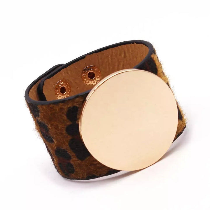 Statement women's wrap bracelet with wild leopard animal print, a chic arm accessory.