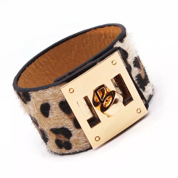 Elegant women's wrap bracelet with wild leopard print, a chic animal print arm accessory.