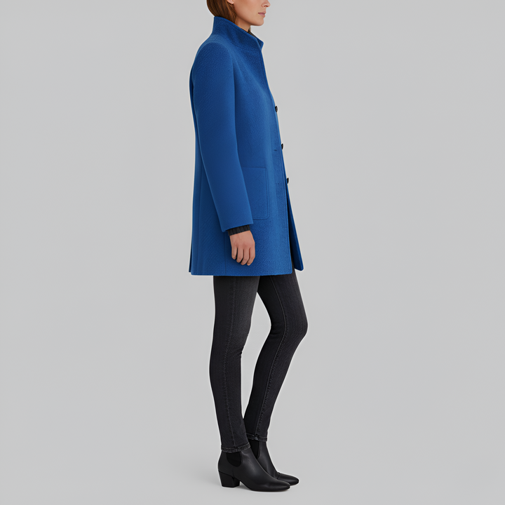Women's warm winter coat. Elegant, chic long outerwear, ideal for stylish cold weather fashion trends.