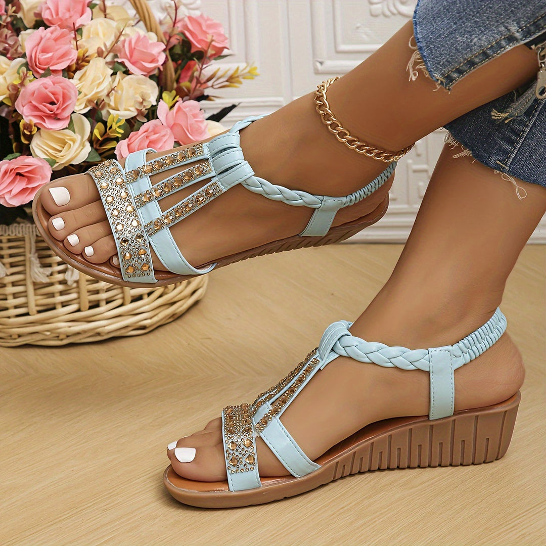 Women's flat woven sandals with elegant rhinestone detailing, comfortable and stylish for summer fashion.