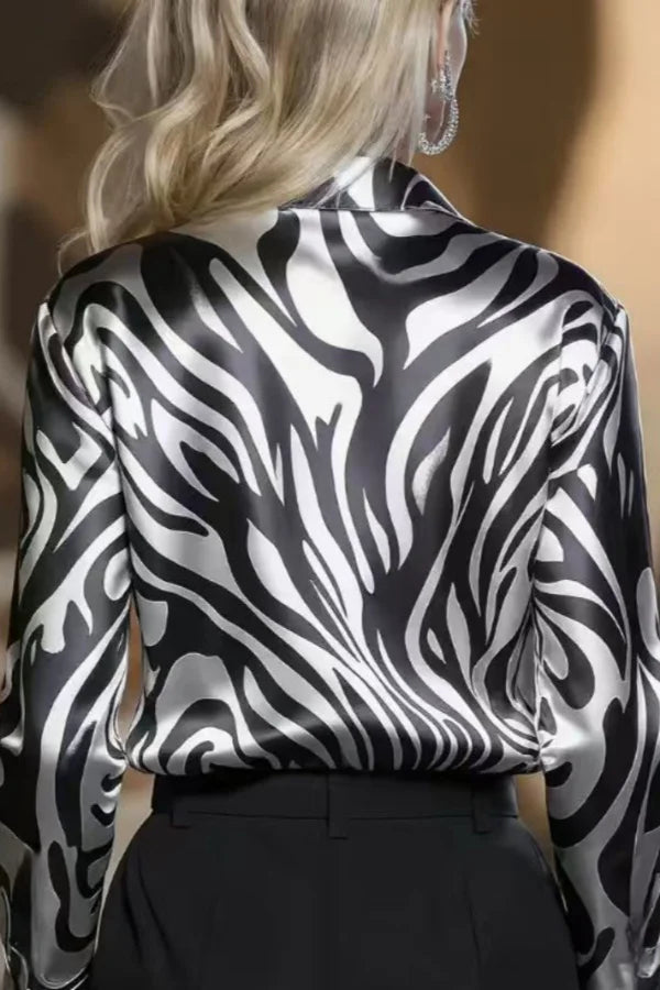 Chic women's black & coffee zebra print button-down shirt, perfect as a fashionable work blouse.