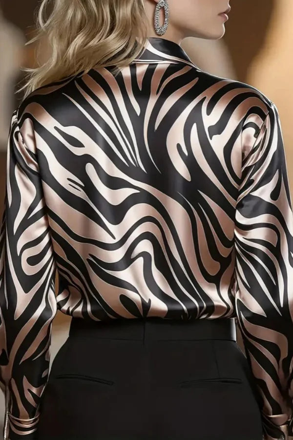 Women's long sleeve zebra print button-down shirt. Chic black & coffee animal print top for elegant office fashion.
