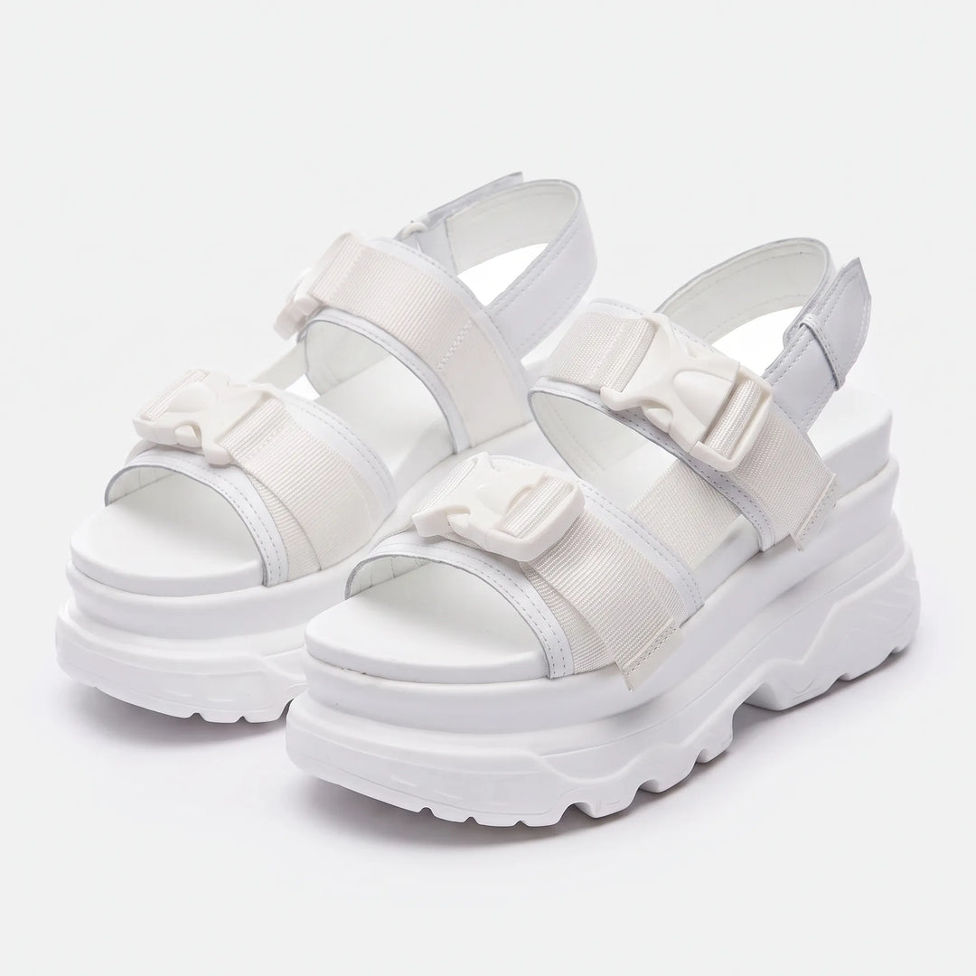 Bold women's chunky platform sandals, designed for streetwear with open toe and secure buckle straps.