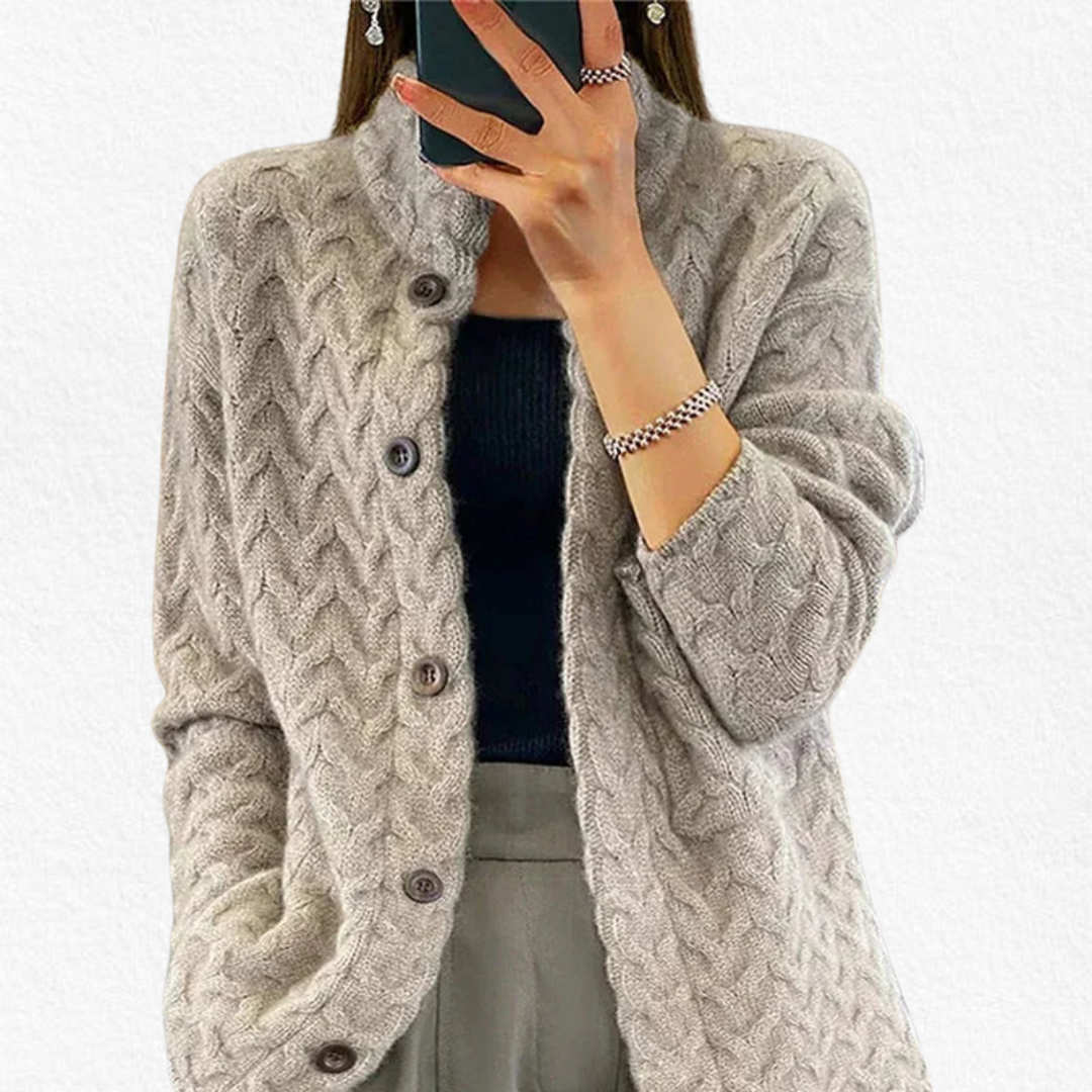 Cozy women's cable knit button cardigan, perfect for fall layering. Relaxed fit chunky knit sweater for casual winter style.
