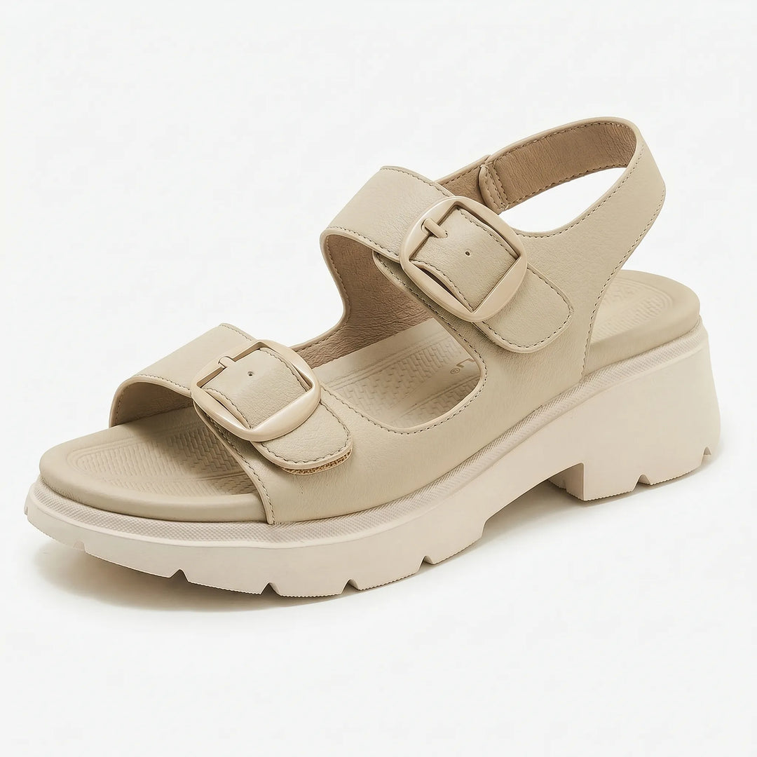 Fashionable women's chunky platform sandals with adjustable straps & open toe. Comfortable summer footwear.