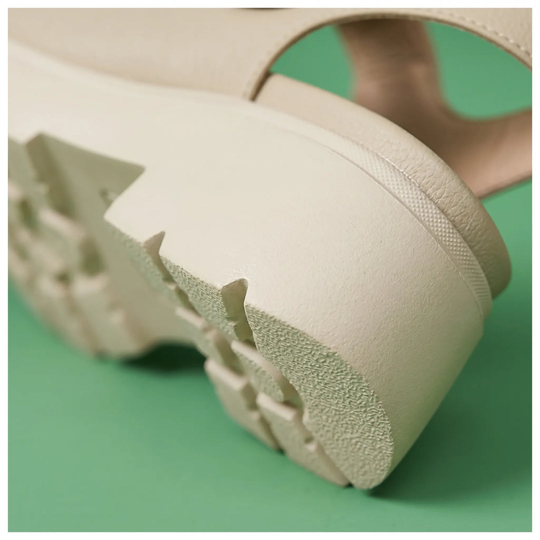 Trendy women's chunky platform sandals for a chic summer look. Casual, comfortable fashion wedge footwear.