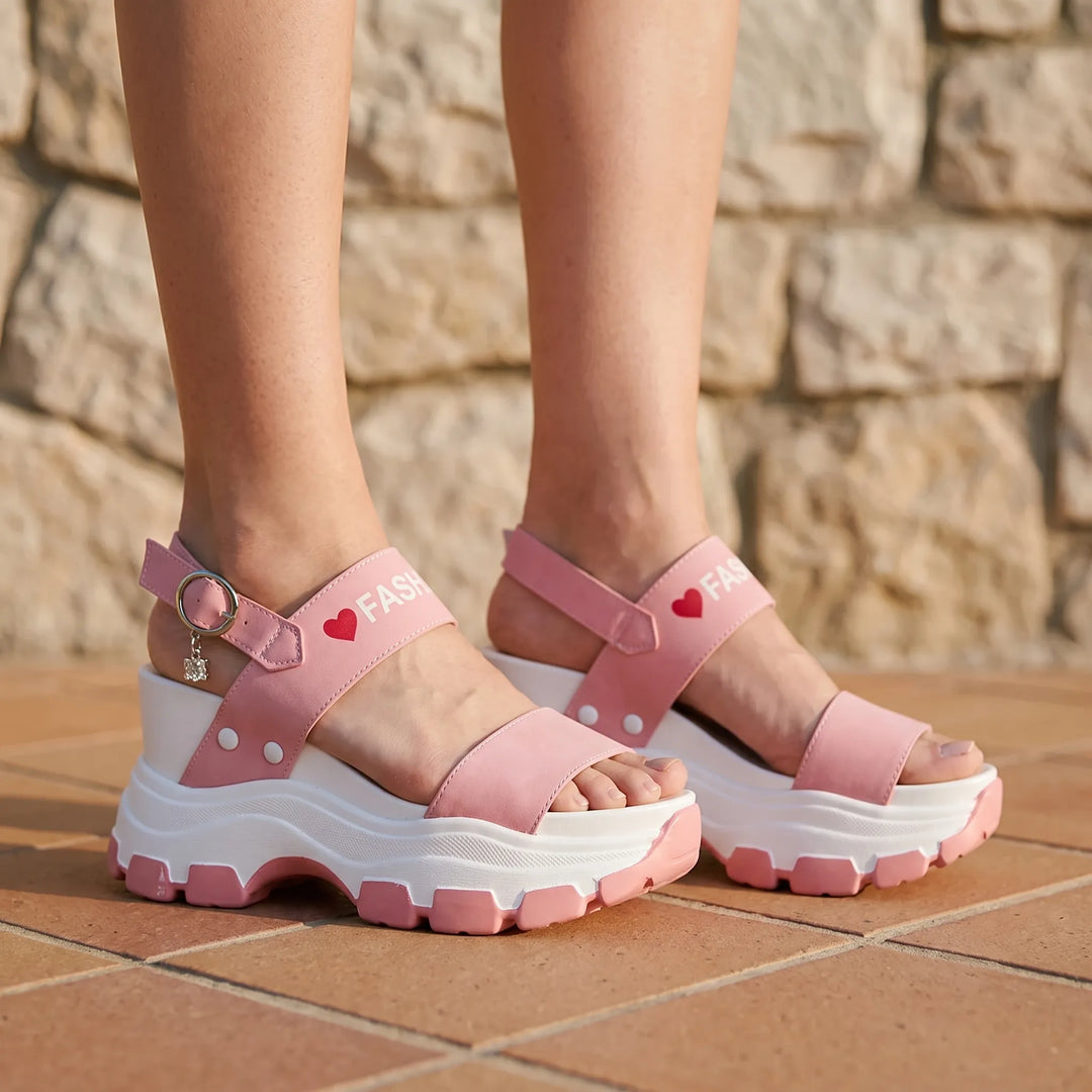 Women's chunky platform sandals with adjustable ankle strap, open toe, and high wedge heel for summer fashion.