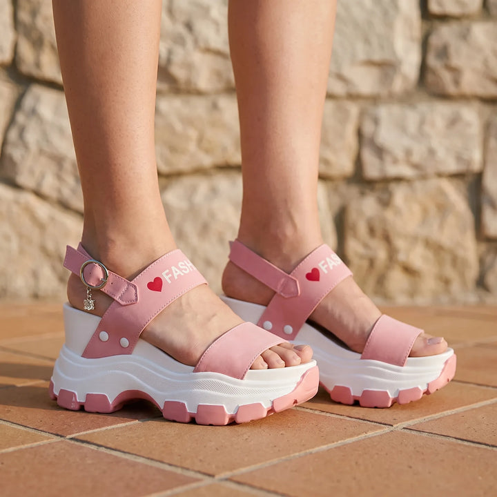 Women's chunky platform sandals with adjustable ankle strap, open toe, and high wedge heel for summer fashion.