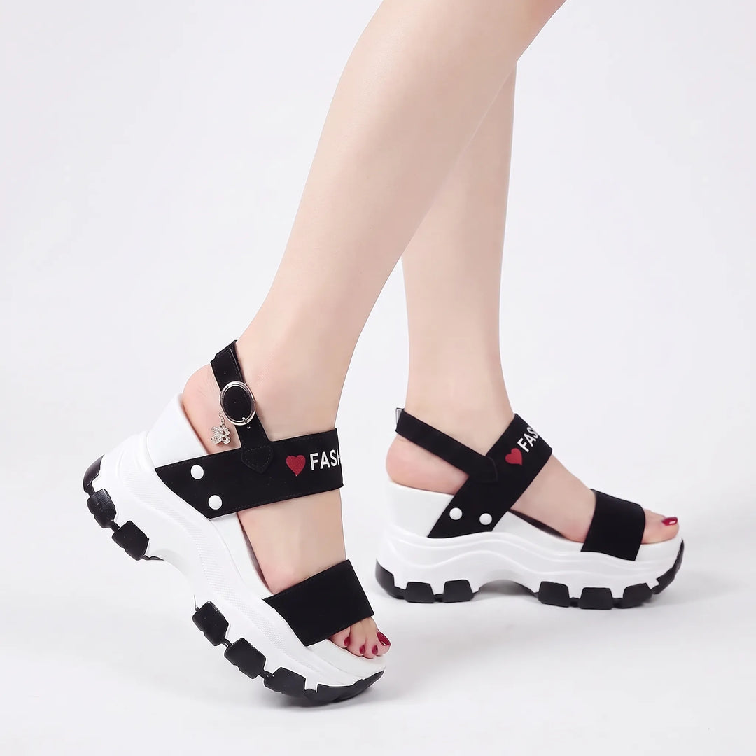 Stylish women's chunky platform sandals for summer, offering a comfortable open-toe design and adjustable ankle strap.