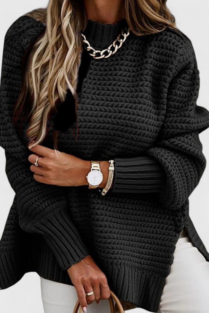 Stylish women's oversized mock neck sweater with chunky rib texture, ideal for relaxed comfort.