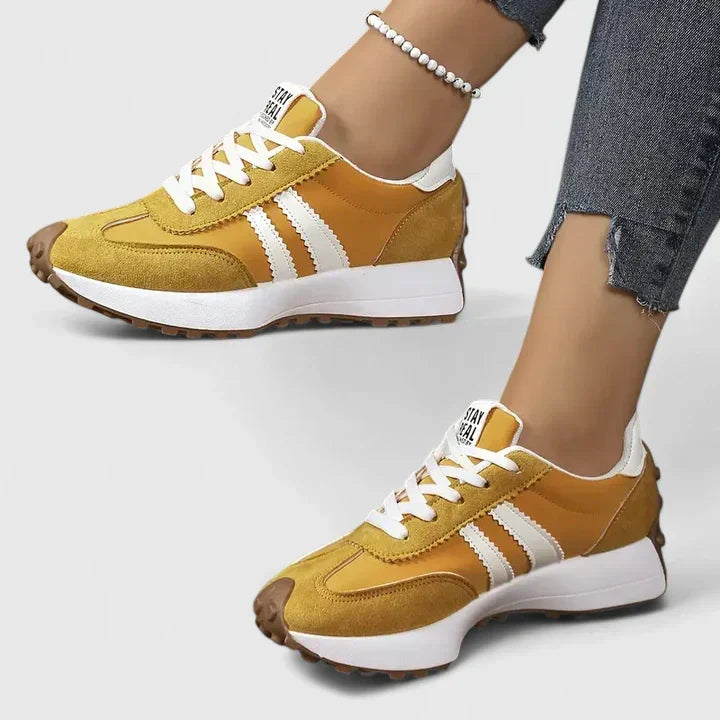 Comfortable women's chunky sole sneakers. Sporty lace-up gym shoes, perfect for active wear and training.