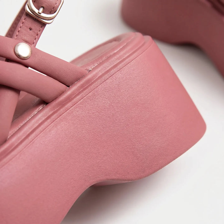 Modern gladiator style women's platform wedge sandals, perfect vacation shoes for summer elegance.