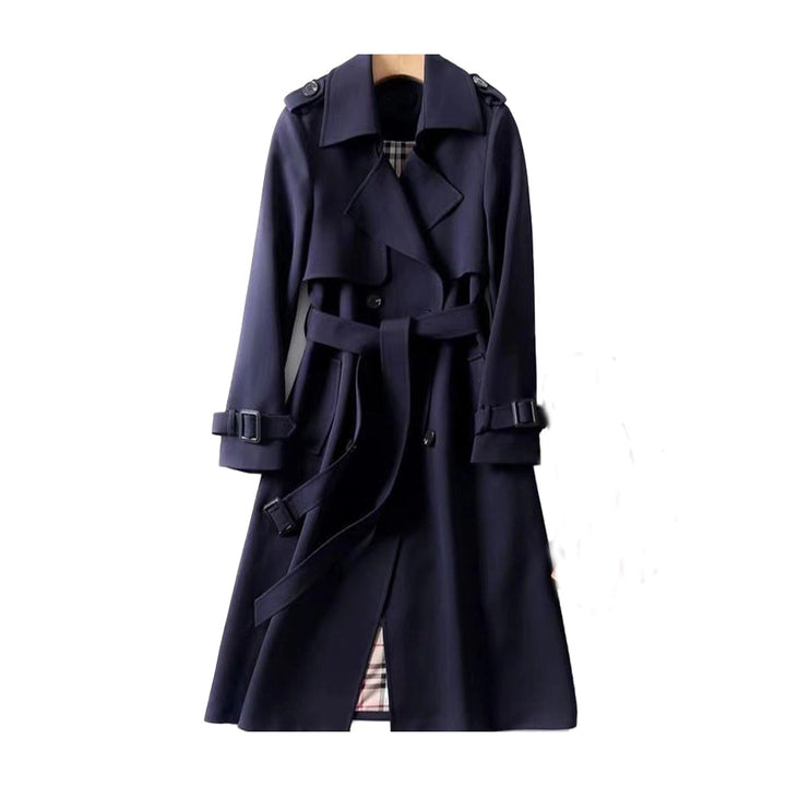 Green women's double-breasted trench coat, a long versatile jacket for sophisticated fashion.