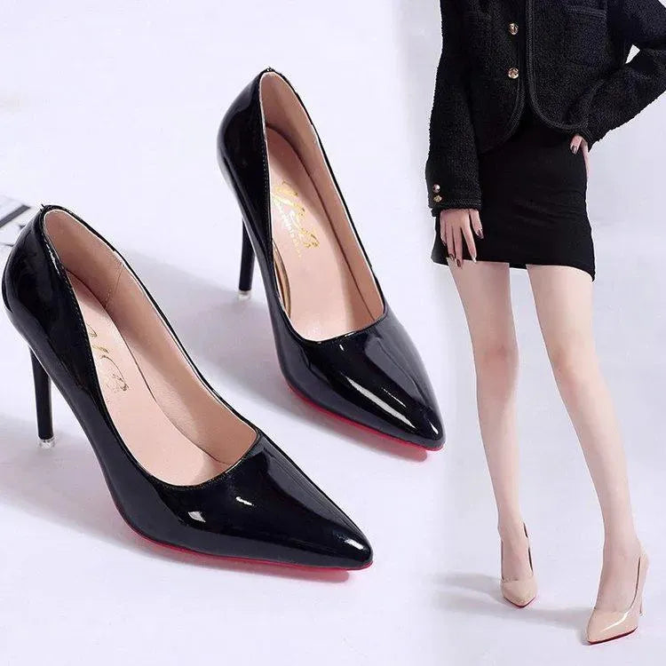 Women's classic black stiletto pumps, pointed toe, high heel, suitable for office & party wear.