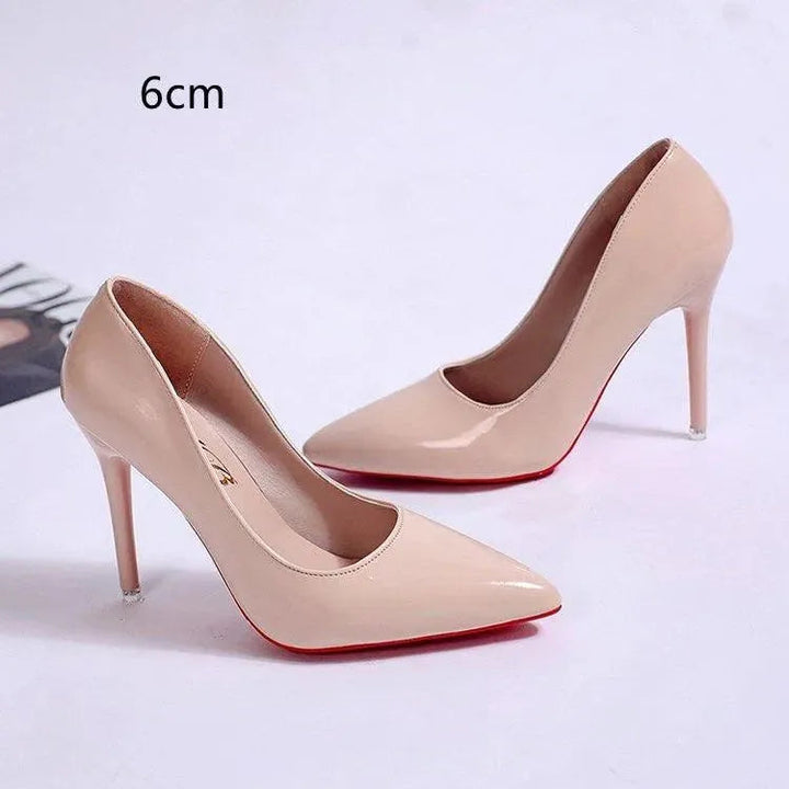 Sleek black stiletto pumps, women's classic high heels, pointed toe, essential formal shoe.