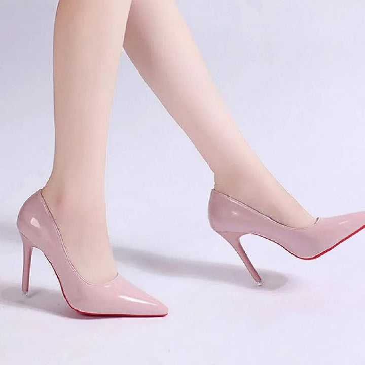 High-fashion black stiletto pumps, women's elegant footwear for formal and party events.