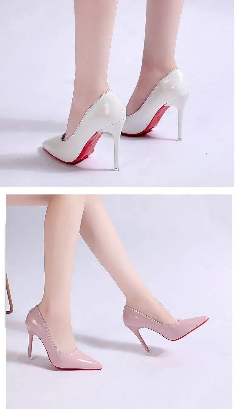Detailed view of women's black stiletto pumps, pointed toe, sleek high heel, elegant design.